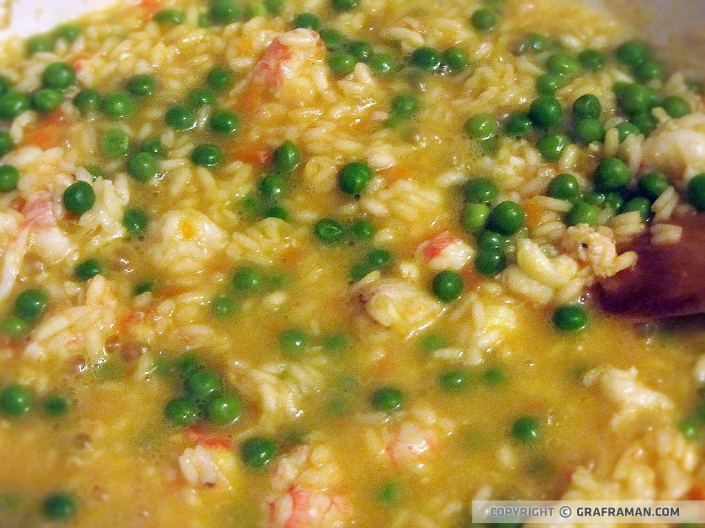 Risotto con scampi e piselli